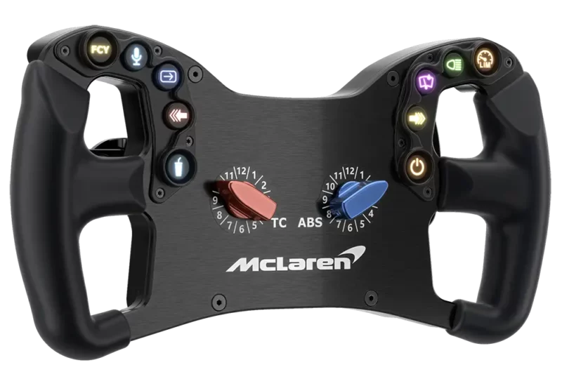 Side shot of the Mclaren Artura GT4 sim steering wheel. Black with red and blue knobs on with backlit buttons photographed against a white background