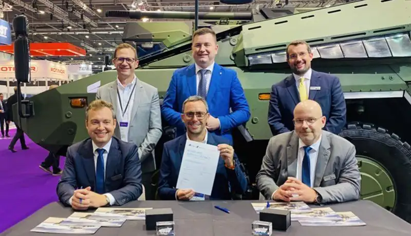 Anthony Moss, Renvale COO proudly displaying the signed contract from RBSL and Rheinmetall