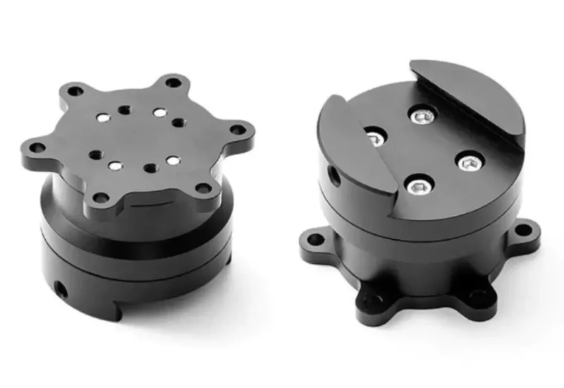 The sim racing Asher Racing SC2 SQR Wheel Side Quick Release kit. Black items photographed on a white background