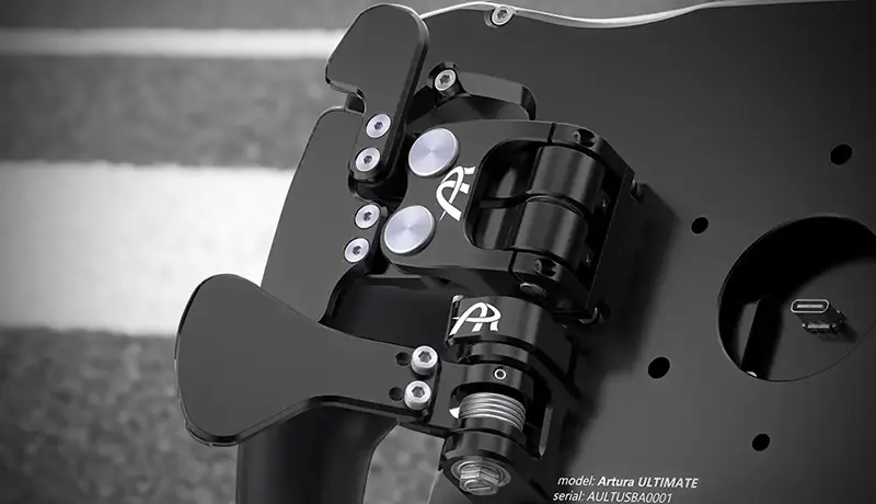 https://www.renvale.com/wp-content/uploads/2024/04/Ascher-McLaren-Artura-Ultimate-precision-crafted-Motorsport-quality-components-like-clutch-shifter-and-magnetic-paddle.webp